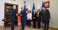 Maciej Berek i Włodzimierz Czarzasty ściskają sobie ręce