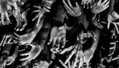 Dłonie więźniów. Ilustracja poglądowa