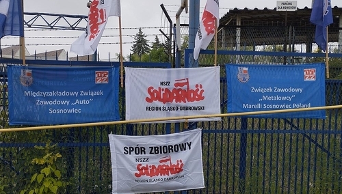 Oflagowany płot firmy Marelli