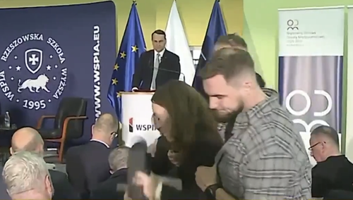 Kobieta wyprowadzona siłą ze spotkania z Radosławem Sikorskim