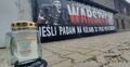 znicz pod muralem "Warszyca"