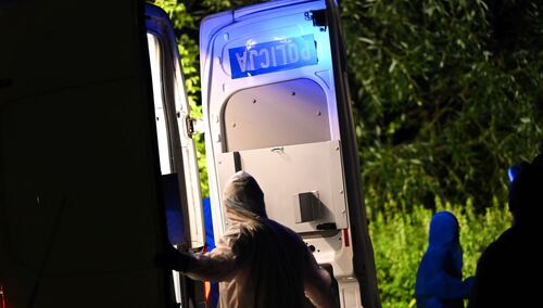 Policjanci z grupy dochodzeniowo-śledczej w miejscu odnalezienia ciała kobiety w Gdańsku-Oliwie