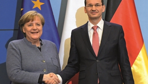 Wizyta Angeli Merkel. Chodzimy wokół niemieckich polityków na palcach. Czas to zmienić