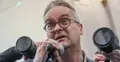Wojciech Czuchnowski przemawia do mikrofonu na konferencji prasowej