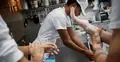 Migranci pracujący w ośrodku integracyjnym w Hiszpanii