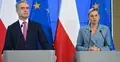 Krzysztof Gawkowski, Barbara Nowacka. W tle flagi Polski i UE