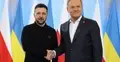 Wołodymyr Zełenski, Donald Tusk. W tle flaga Polski i Ukrainy