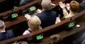 posłowie podczas głosowania na sali sejmowej