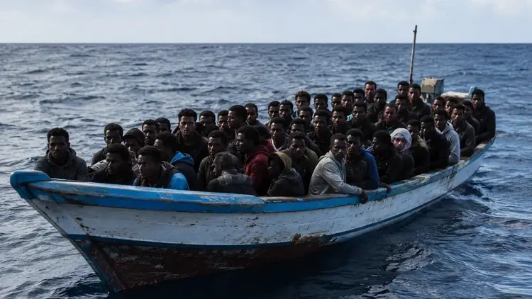 Nielegalni imigranci na łodzi - grafika poglądowa