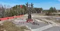 pomnik ofiar ludobójstwa na Wołyniu w Domostwie 