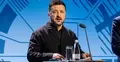 Wołodymyr Zełenski przemawia na konferencji do mikrofonu