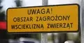 Tablica ostrzegająca przed zagrożeniem wścieklizną